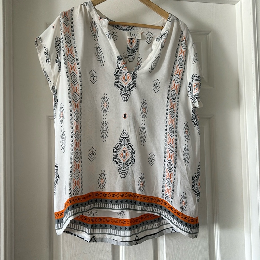 Large flowy blouse, lightweight and cool.
